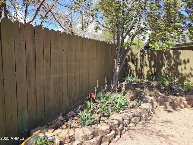 view of yard featuring fence