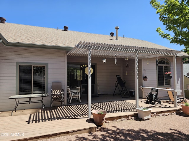 rear view of property with a pergola and a patio