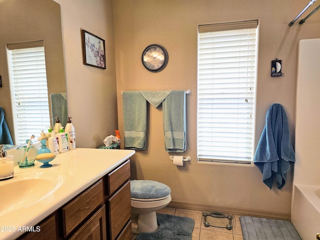 bathroom with a tub to relax in, tile patterned floors, toilet, vanity, and a shower