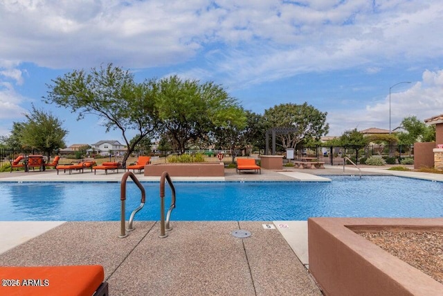 view of pool with a patio area