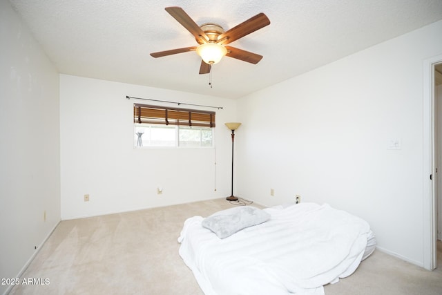 10018 N 97th Dr Unit A, Peoria, AZ 85345 - carpeted bedroom with a ceiling fan