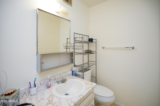 10018 N 97th Dr Unit A, Peoria, AZ 85345 - bathroom featuring vanity and toilet