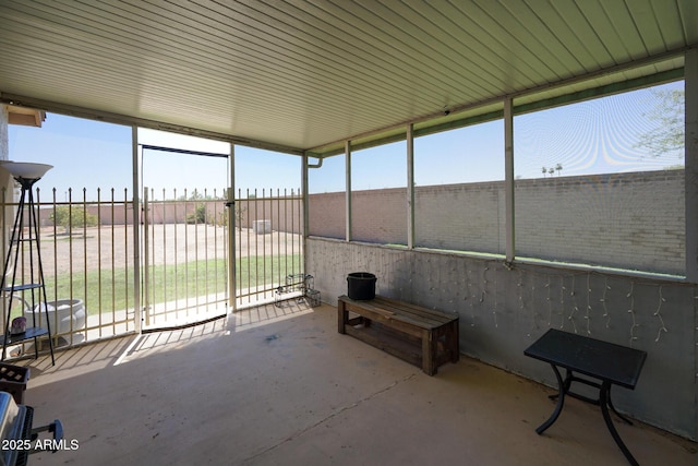 10018 N 97th Dr Unit A, Peoria, AZ 85345 - unfurnished sunroom featuring plenty of natural light