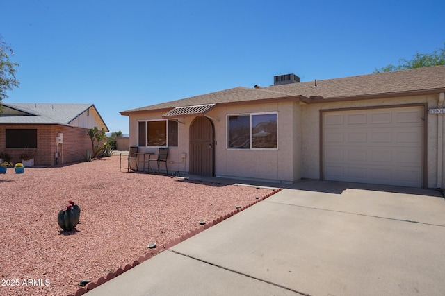 10018 N 97th Dr Unit A, Peoria, AZ 85345 - ranch-style home featuring concrete driveway, an attached garage, and stucco siding