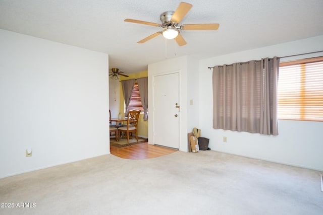 10018 N 97th Dr Unit A, Peoria, AZ 85345 - carpeted empty room with ceiling fan
