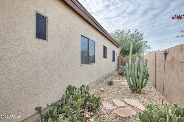 17562 W Agave Ct, Goodyear, AZ 85338 - view of side of property featuring a fenced backyard and stucco siding