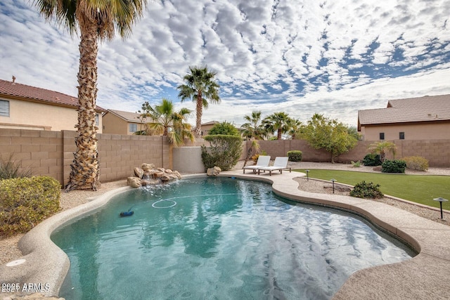 17562 W Agave Ct, Goodyear, AZ 85338 - view of swimming pool featuring a fenced backyard and a patio