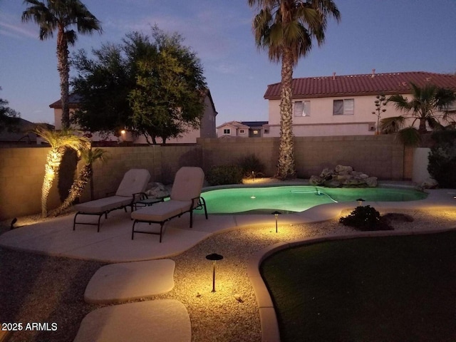 17562 W Agave Ct, Goodyear, AZ 85338 - patio terrace at dusk featuring a patio and a fenced backyard