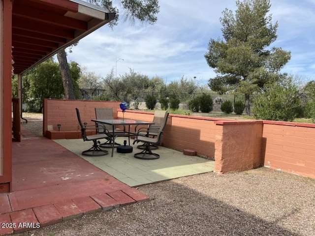 view of patio / terrace with fence and outdoor dining space
