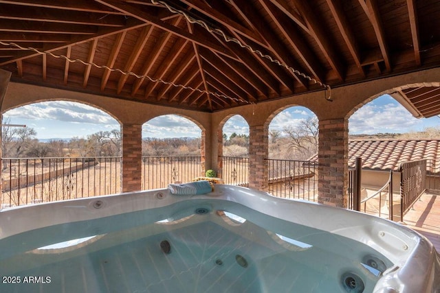 view of pool featuring a hot tub