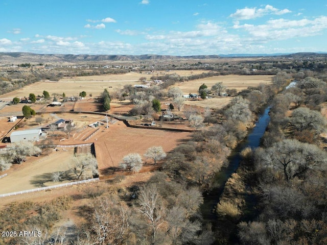 bird's eye view with a rural view and a mountain view