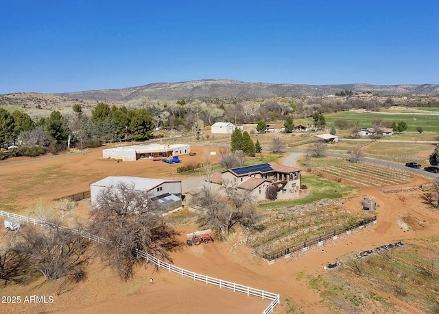 bird's eye view with a mountain view and a rural view