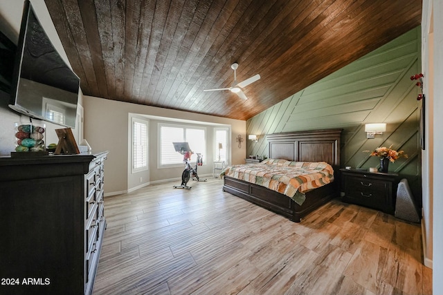 bedroom featuring ceiling fan, light wood-type flooring, wood ceiling, and vaulted ceiling