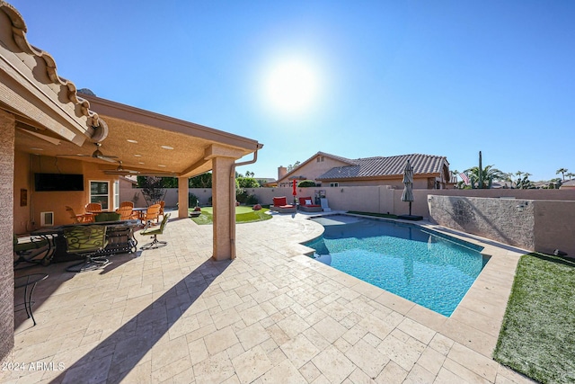 view of pool featuring a patio and ceiling fan