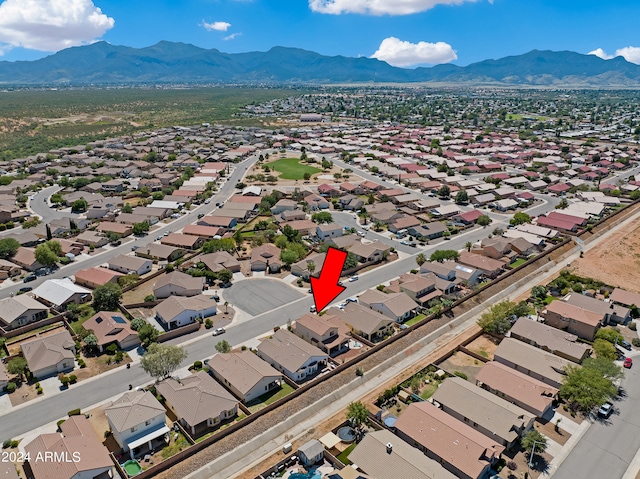 drone / aerial view featuring a mountain view