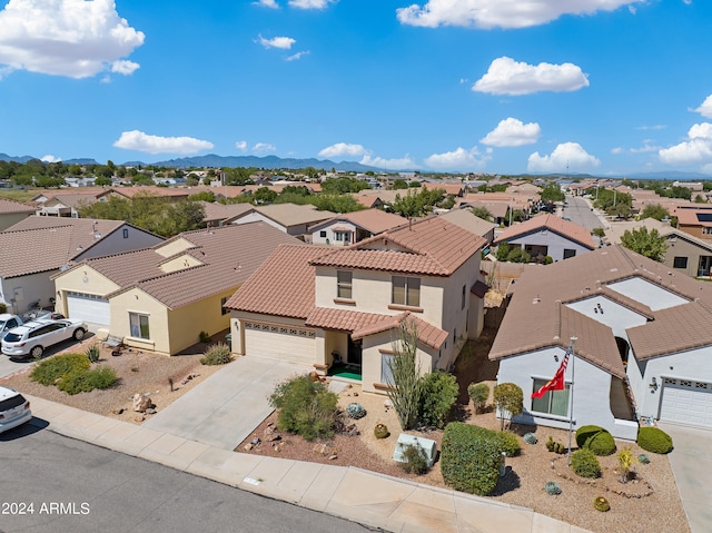 drone / aerial view featuring a mountain view