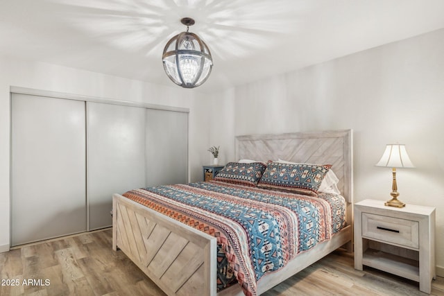 8787 E Mountain View Rd Unit 2100, Scottsdale, AZ 85258 - bedroom with wood finished floors and a closet