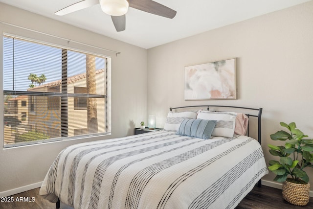 8787 E Mountain View Rd Unit 2100, Scottsdale, AZ 85258 - bedroom featuring baseboards, wood finished floors, and a ceiling fan