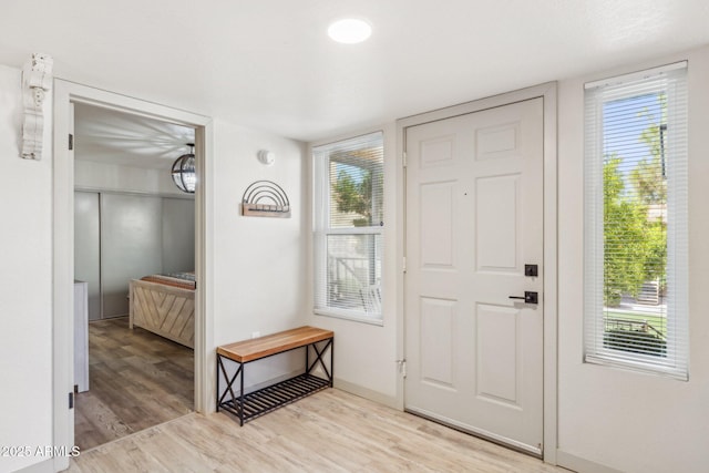 8787 E Mountain View Rd Unit 2100, Scottsdale, AZ 85258 - foyer entrance featuring light wood-style floors and plenty of natural light