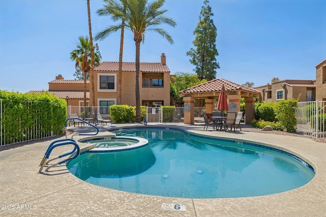 8787 E Mountain View Rd Unit 2100, Scottsdale, AZ 85258 - view of pool with a pool with connected hot tub, a patio area, and a gazebo