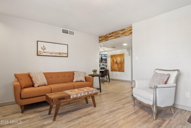 8787 E Mountain View Rd Unit 2100, Scottsdale, AZ 85258 - living room with light wood-type flooring and baseboards