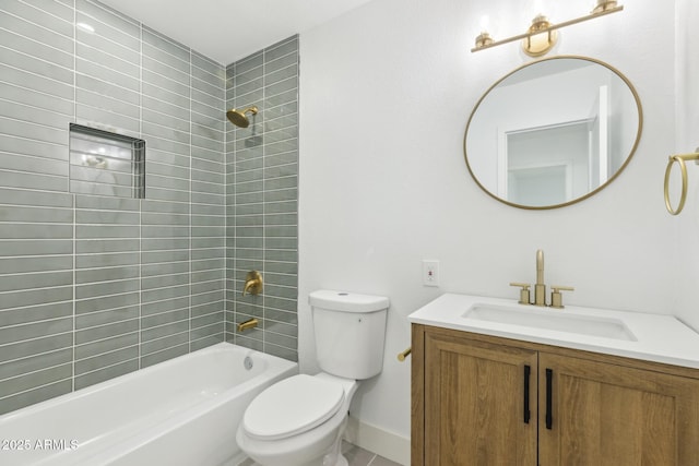 bathroom featuring bathing tub / shower combination, vanity, toilet, and baseboards