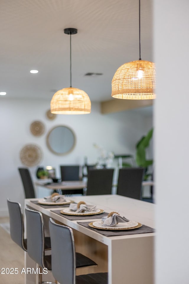 dining room with recessed lighting