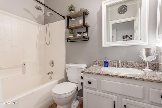 bathroom featuring toilet, shower / washtub combination, and vanity