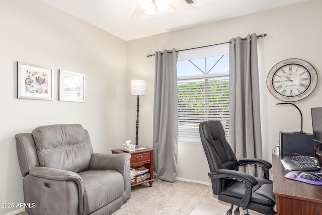 office space featuring baseboards, carpet floors, and ceiling fan