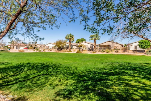 view of yard featuring a residential view