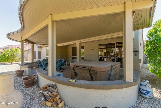 view of patio featuring a hot tub