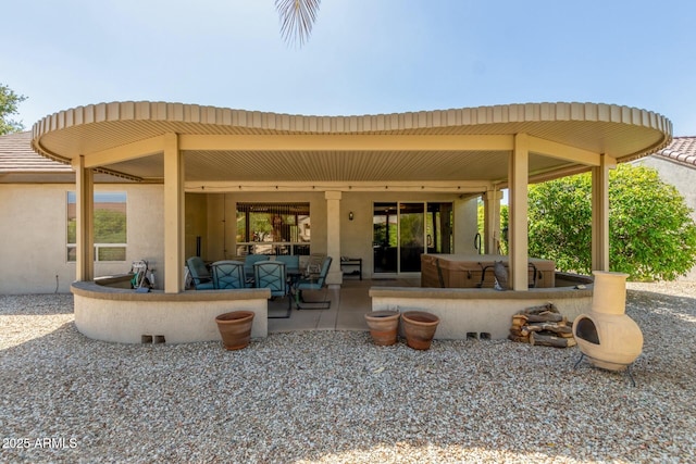 view of patio featuring a hot tub