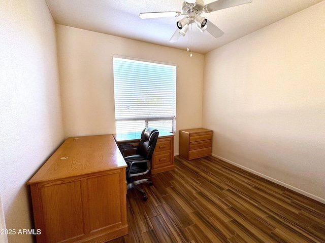 home office with ceiling fan, a healthy amount of sunlight, and dark hardwood / wood-style floors