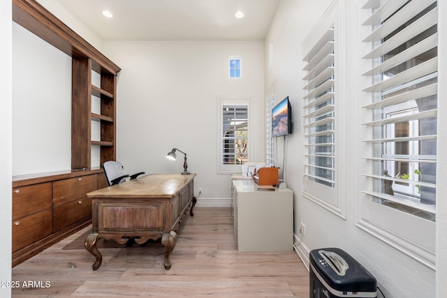 office with baseboards, recessed lighting, and light wood-style floors