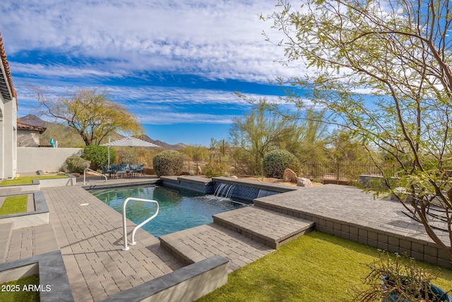 view of pool with a patio area, a fenced backyard, and a fenced in pool