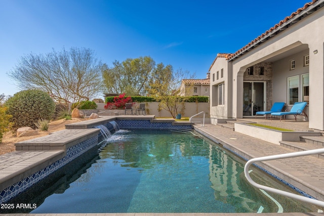 view of pool featuring a fenced backyard, a fenced in pool, and a patio