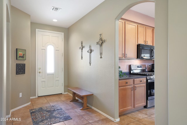 view of tiled foyer