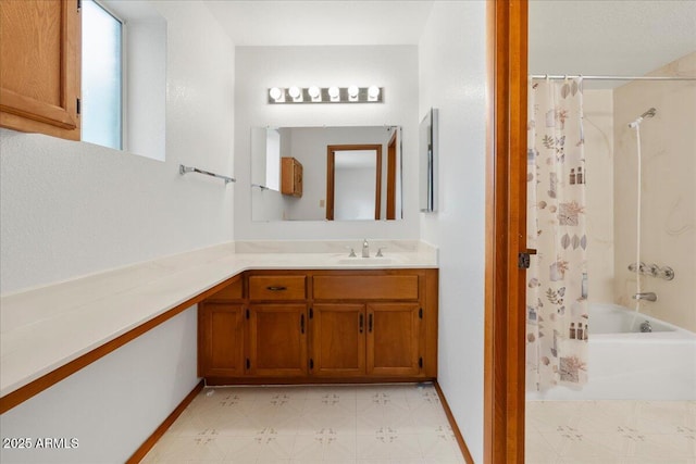 full bathroom with vanity, shower / bath combo with shower curtain, and tile patterned floors