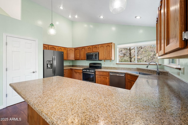 1405 Eagle Ridge Rd, Prescott, AZ 86301 - kitchen with stainless steel appliances, a sink, high vaulted ceiling, a peninsula, and brown cabinetry