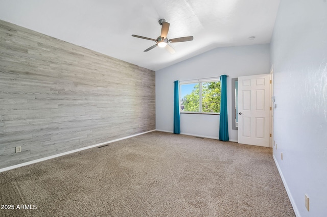 1405 Eagle Ridge Rd, Prescott, AZ 86301 - spare room featuring a ceiling fan, vaulted ceiling, baseboards, and carpet floors