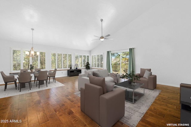 1405 Eagle Ridge Rd, Prescott, AZ 86301 - living area with a chandelier, hardwood / wood-style flooring, baseboards, plenty of natural light, and high vaulted ceiling