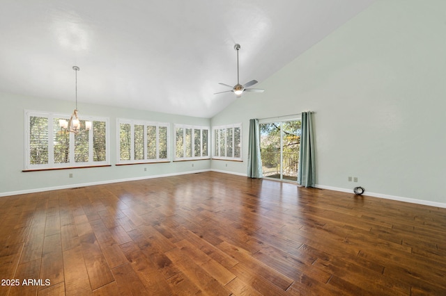 1405 Eagle Ridge Rd, Prescott, AZ 86301 - spare room with a chandelier, ceiling fan, baseboards, dark wood-style floors, and high vaulted ceiling
