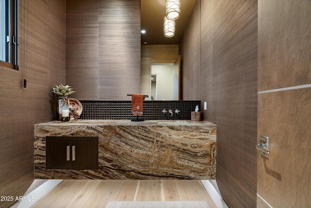 bathroom with vanity and hardwood / wood-style floors