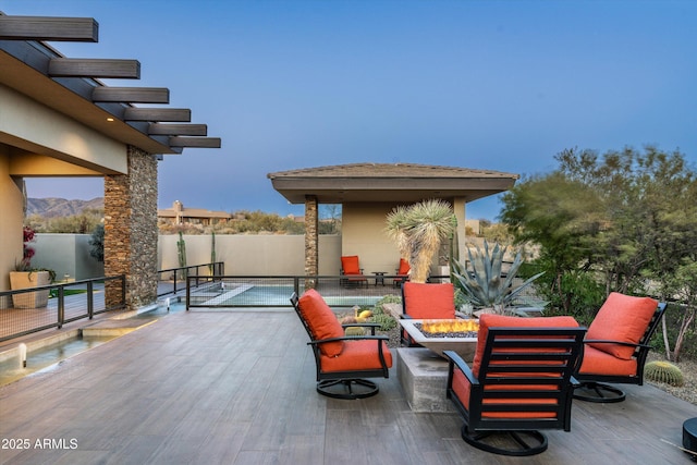 view of patio with a fire pit