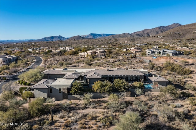 drone / aerial view featuring a mountain view