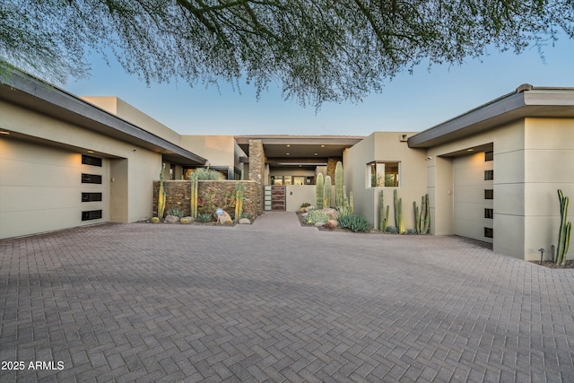 view of front of property with a garage