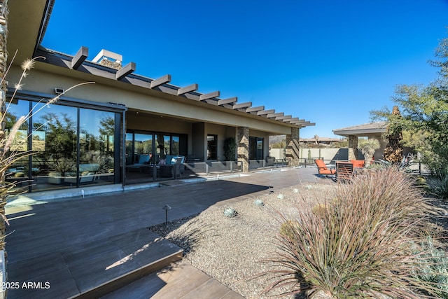 back of house featuring a patio