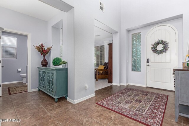 entrance foyer with tile patterned flooring