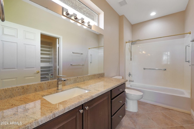 full bathroom with toilet, tile patterned flooring, vanity, and tub / shower combination