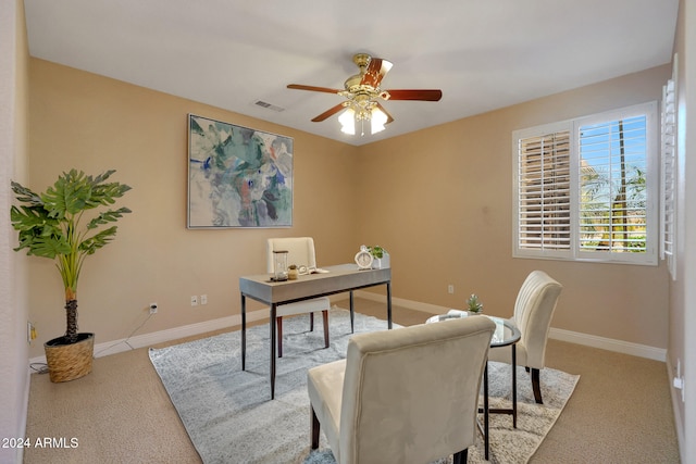 home office with light colored carpet and ceiling fan